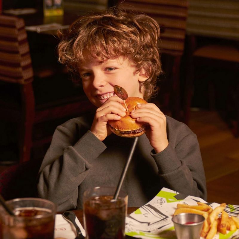Child eating burger at Hard Rock Cafe