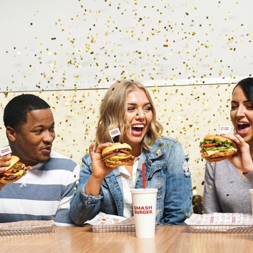 Friends eating burgers